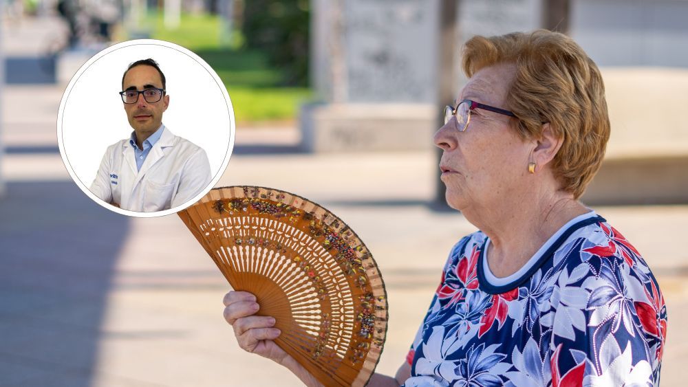 El cardiólogo Alfonso Valle y una mujer que se abanica por la una ola de calor El cardiólogo Alfonso Valle y una mujer que se abanica por la una ola de calor